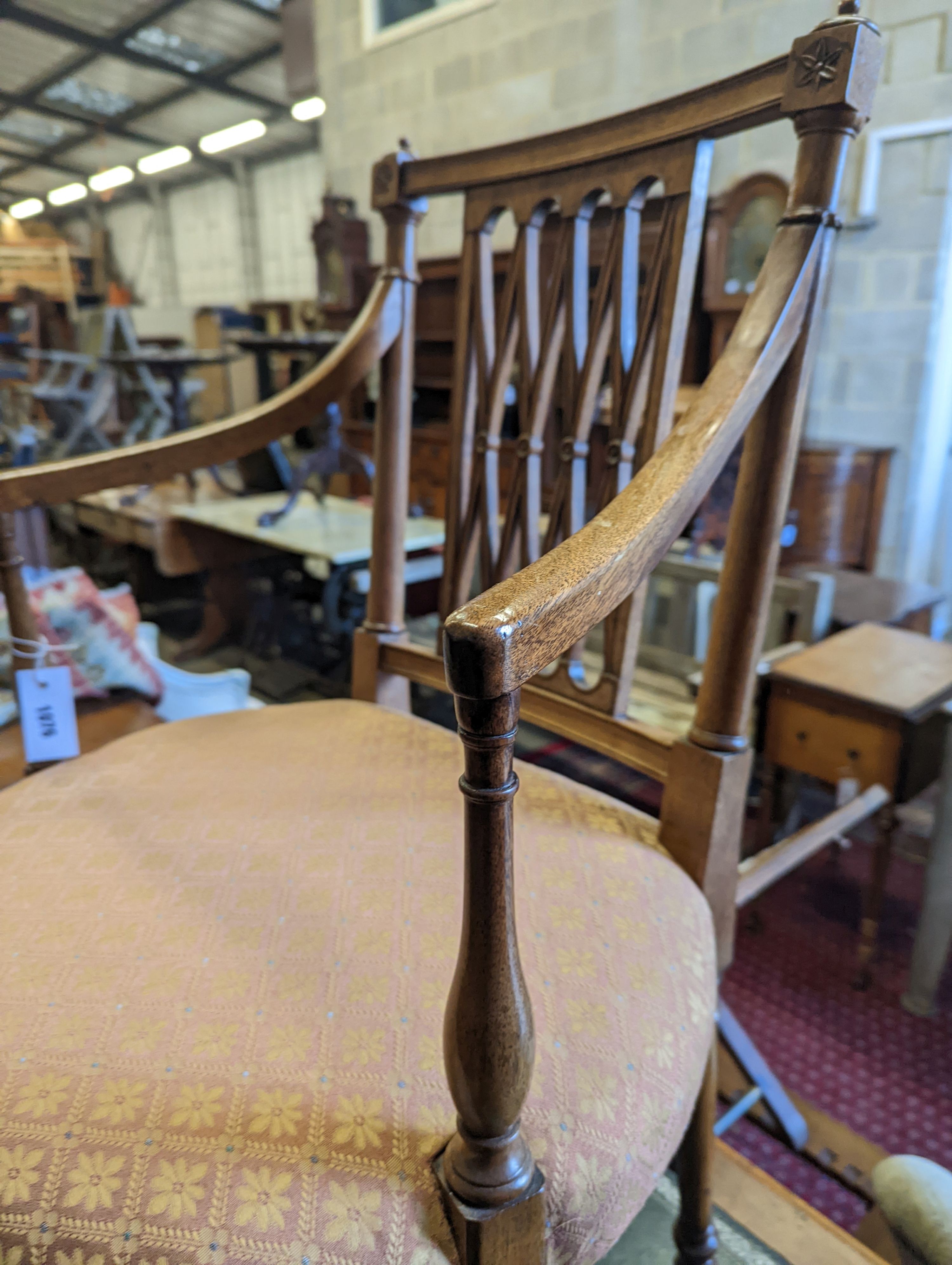 A Sheraton design mahogany elbow chair, width 54cm, depth 44cm, height 93cm